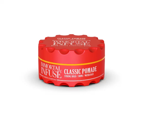 Die Immortal Classic Pomade (Rot) ermöglicht müheloses Auftragen und bietet zusätzliche Stärke, um einen eleganten Look zu schaffen. Sie verströmt einen Hauch von klassischem Duft und verleiht Ihrem Haar außergewöhnlichen Glanz, während es gleichzeitig betont wird.