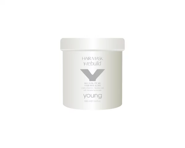 Young Y-Rebuild Mask, Haarmaske, der italienischen Marke Young, mit Macadamia und Keratin, speziell für behandeltes Haar. Dank ihrer reichhaltigen Formel trägt sie dazu bei, Glanz und Stärke für geschädigtes Haar wiederherzustellen, das durch wiederholte technische und chemische Behandlungen geschwächt wurde.